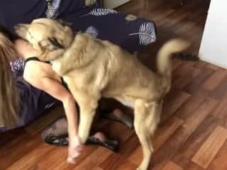 A young woman and her dog