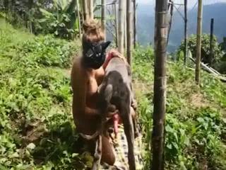 Attractive dog will utilize its entire length to penetrate her throat outside