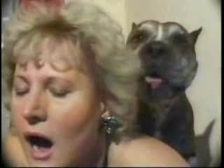 An older woman and her canine companion