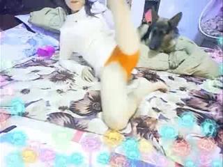 Asian web girl and her canine companion (audio sync)